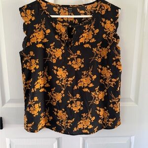 SHEIN Black Top with Orange Floral Design